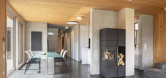 [Translate to Italian:] Wood meets concrete in interior